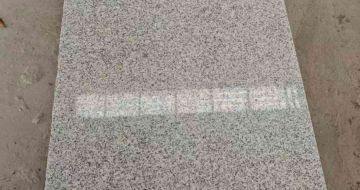 梧州芝麻白光面毛板